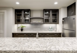 Refined Kitchen Design Starts With Unistone Carrara Misterio Quartz